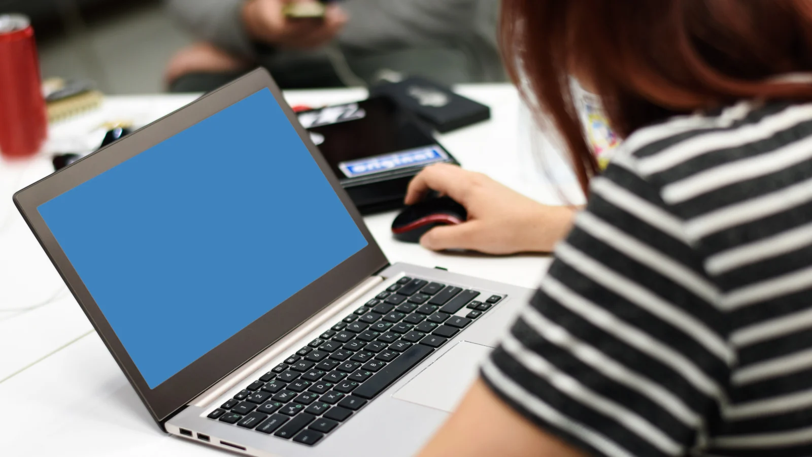 Startup business team working together on a laptop