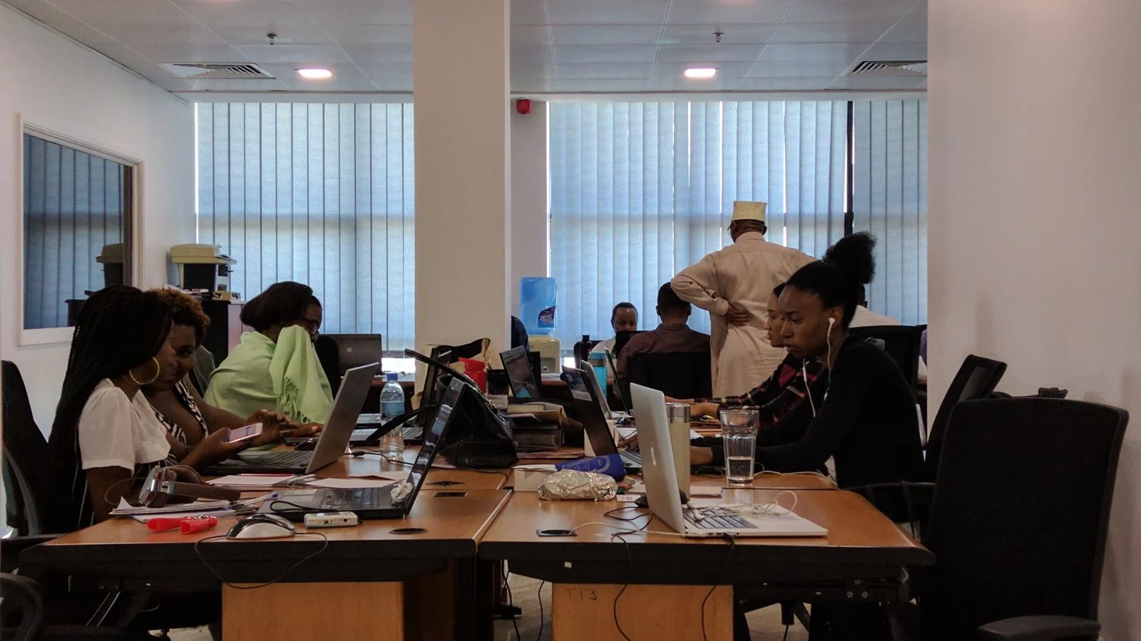 Team working inside the ZoomTanzania internet startup office in Dar es Salaam